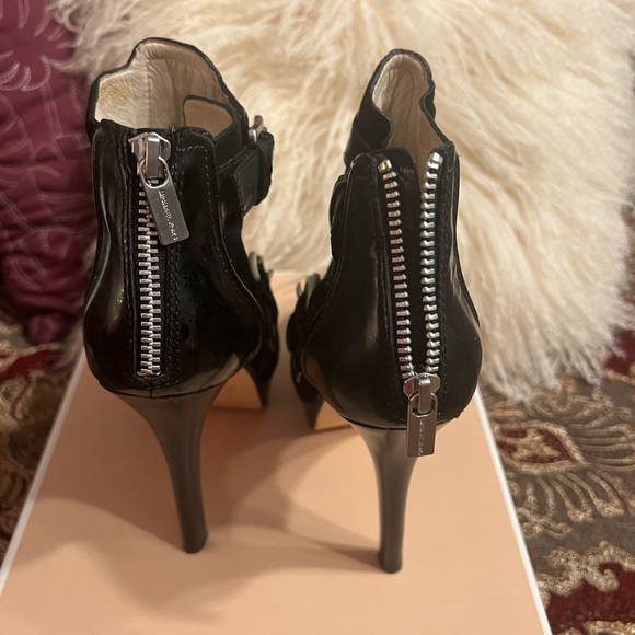 Michael Kors patent leather platform heels. Buckles and ankle height. 
Size 7M - Picture 12 of 16